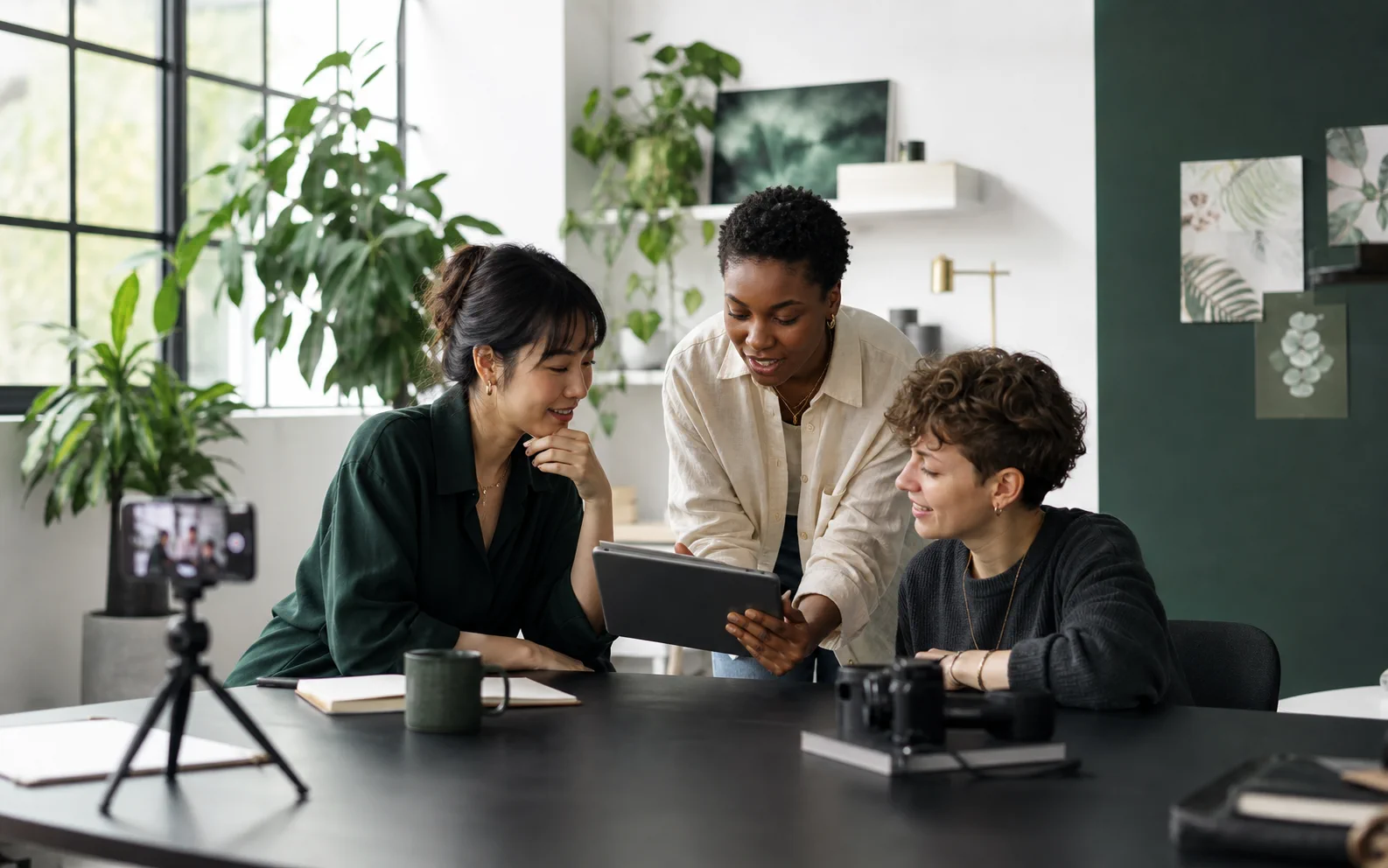 Global wellness creators reviewing educational content together